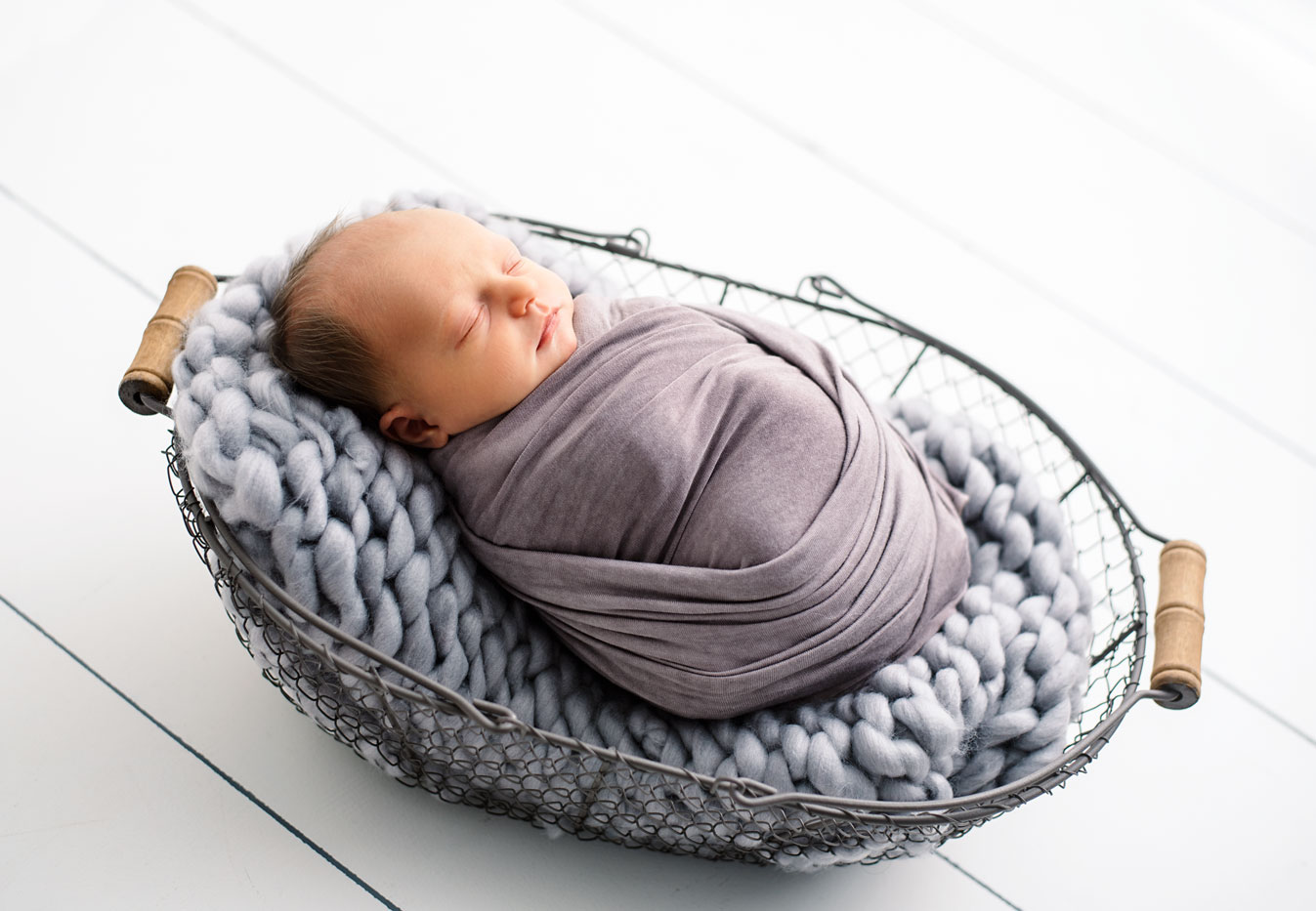 Newborn baby in basket