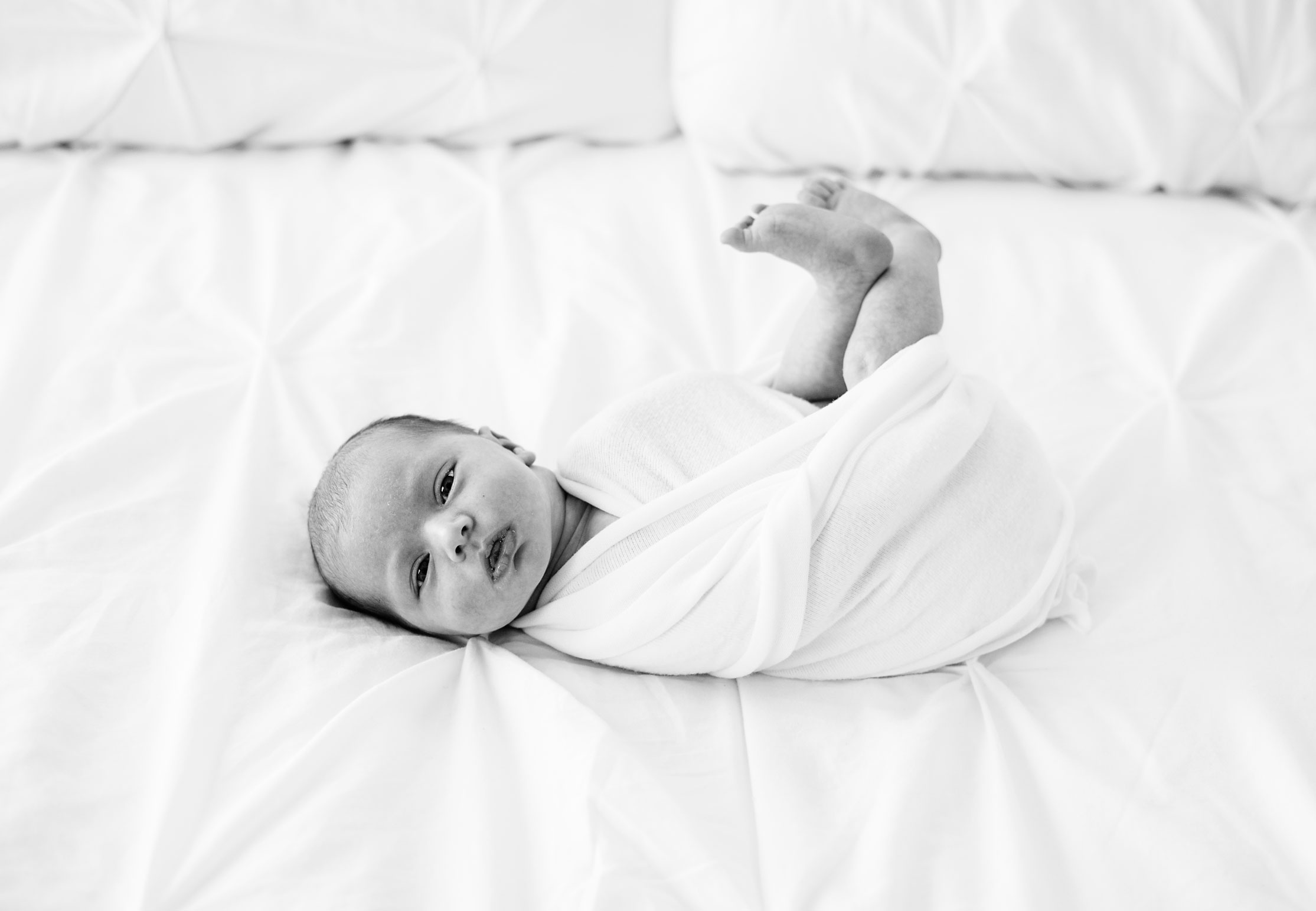 Newborn on Bed