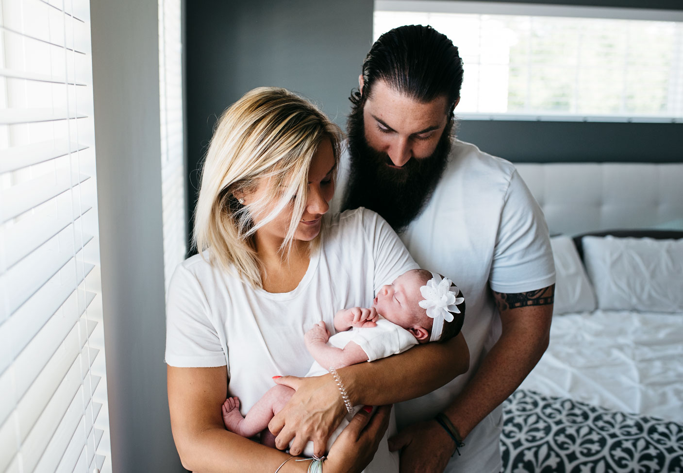 Lifestyle Newborn Session Parents Holding Baby